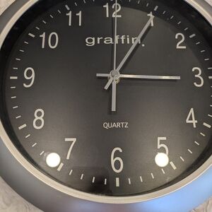 Raffi Black Quartz Wall Clock - Modern Metallic Frame